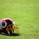 A Washington, D.C., NFL team helmet sits on the field prior to the game against the Baltimore Ravens at M&T Bank Stadium on Oct. 9, 2016, in Baltimore. (Todd Olszewski/Getty Images)